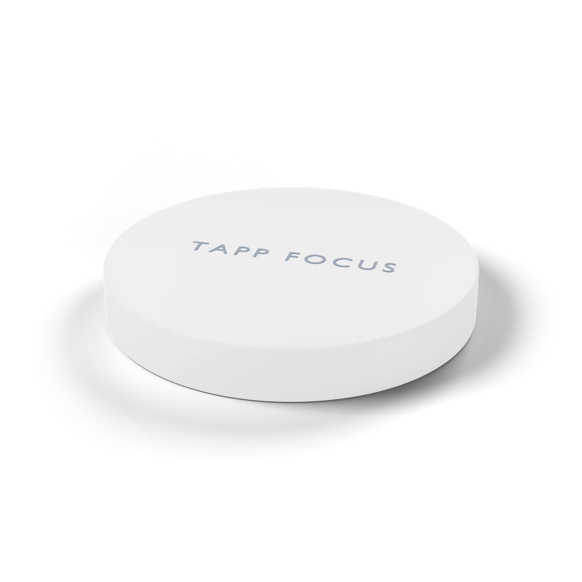 O Tapp Focus: um disco branco e fosco com o nome gravado no centro